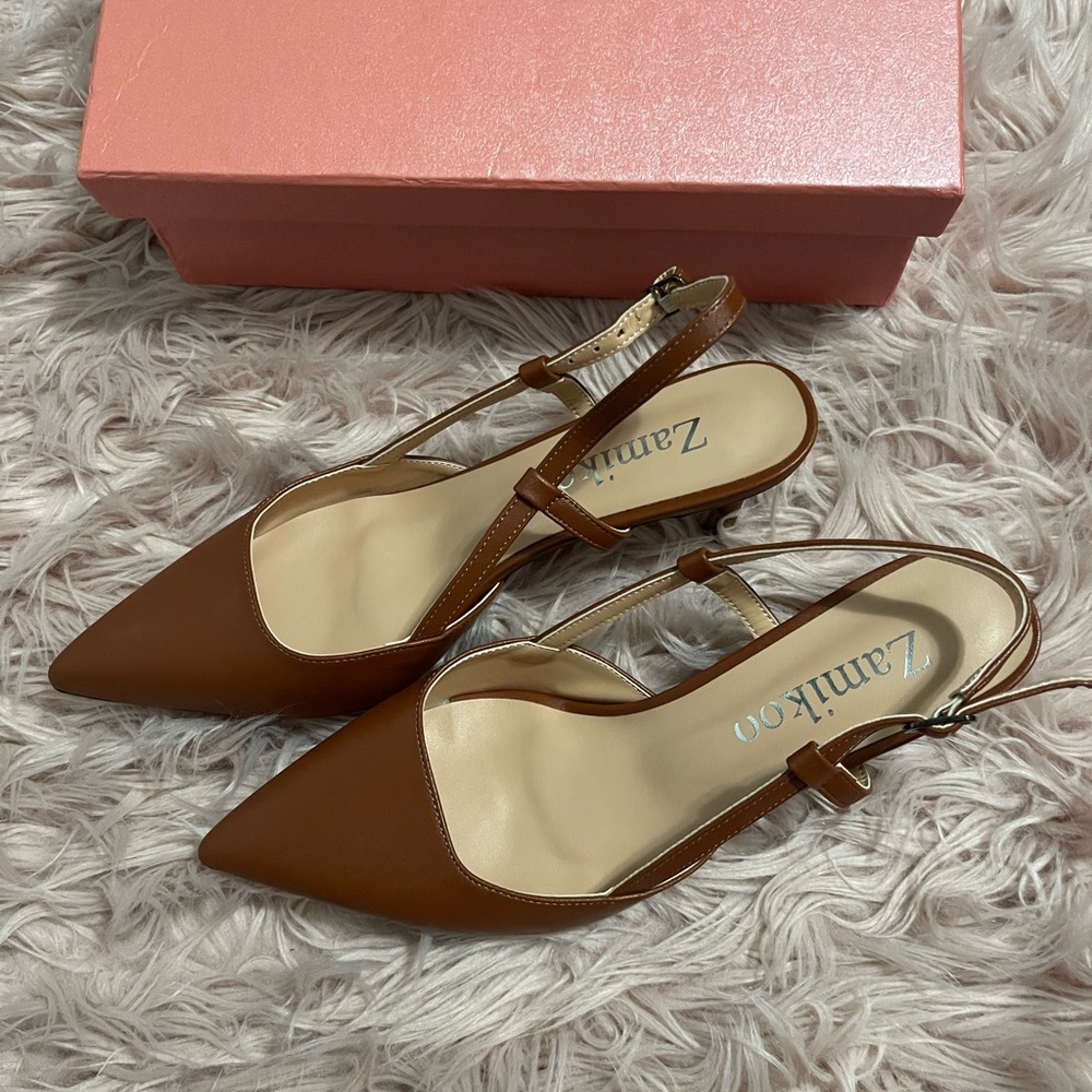 Brand new never worn.

Zamikoo Women's Pointed Toe Slingback Pumps Ankle Strap